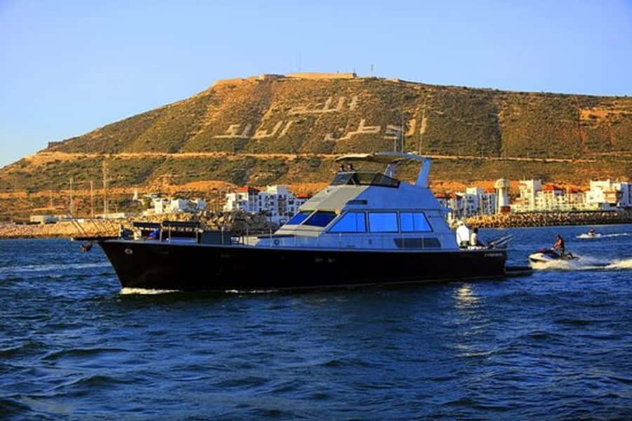 Agadir: Boat Trip with Fishing, Swimming, and BBQ Lunch - Coastal views without a packed sightseeing schedule