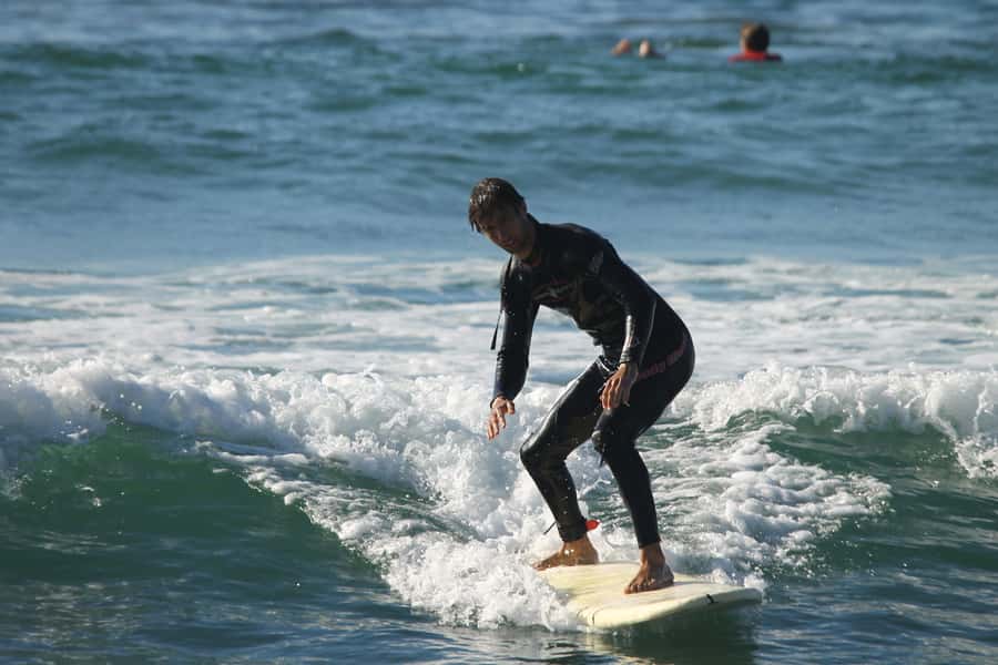Agadir: Taghazout Beach Surf Lesson with Lunch and Transfer - What the $48 price really covers