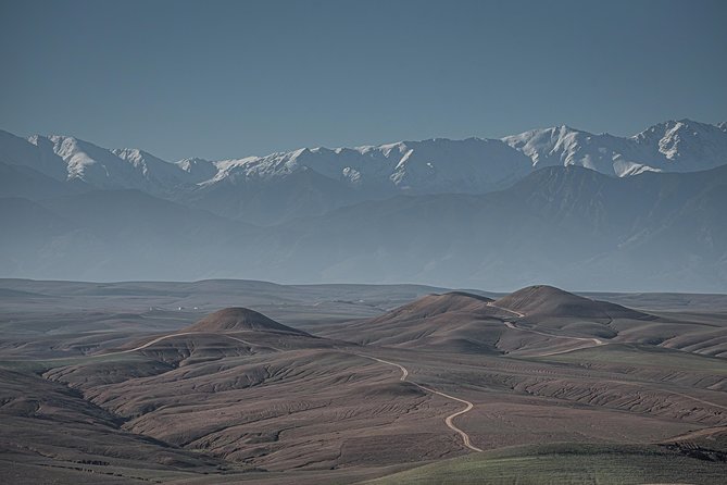 Agafay Desert Camel Experience with snack from Marrakech - Atlas Mountain views from the rocky hills