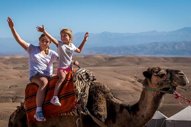 Agafay Desert: Camel Ride and Quad bike with Dinner Show - Moroccan dinner beneath a Berber tent