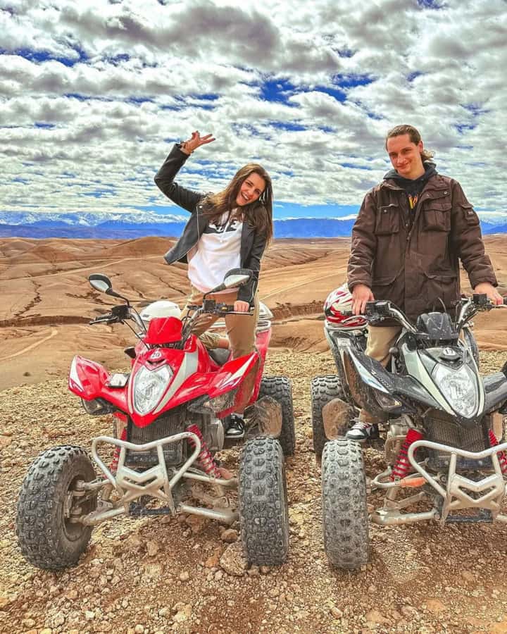 Agafay Desert Day: Quad Bike, Lunch & Swim Adventure - Camel riding in a place that feels made for photographs