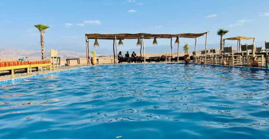 Agafay Desert Day: Quad Bike, Lunch & Swim Adventure - A desert pool with an hour to cool off