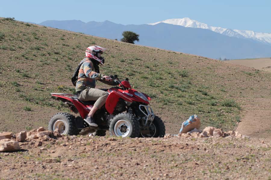 Agafay Desert: Quad, Camel Ride & Luxury Lunch with Pool - Two Hours on an Agafay Quad