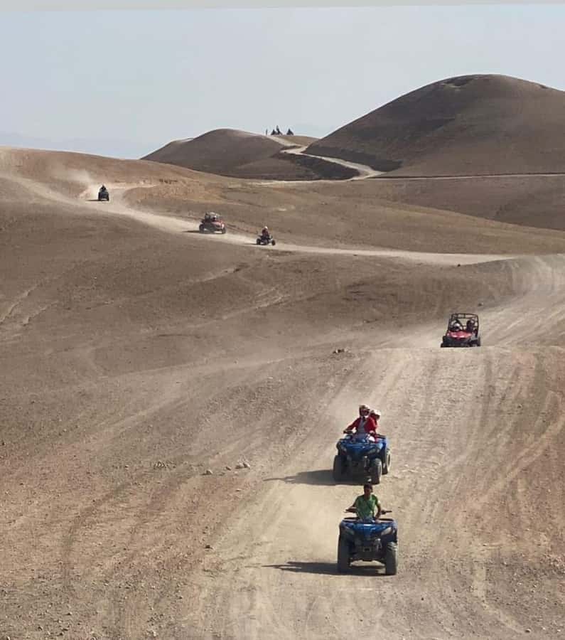 Agafay Tour: Sunset, Dinner, Camel ride, Quad and fire show - Dinner, Berber music, and the fire show