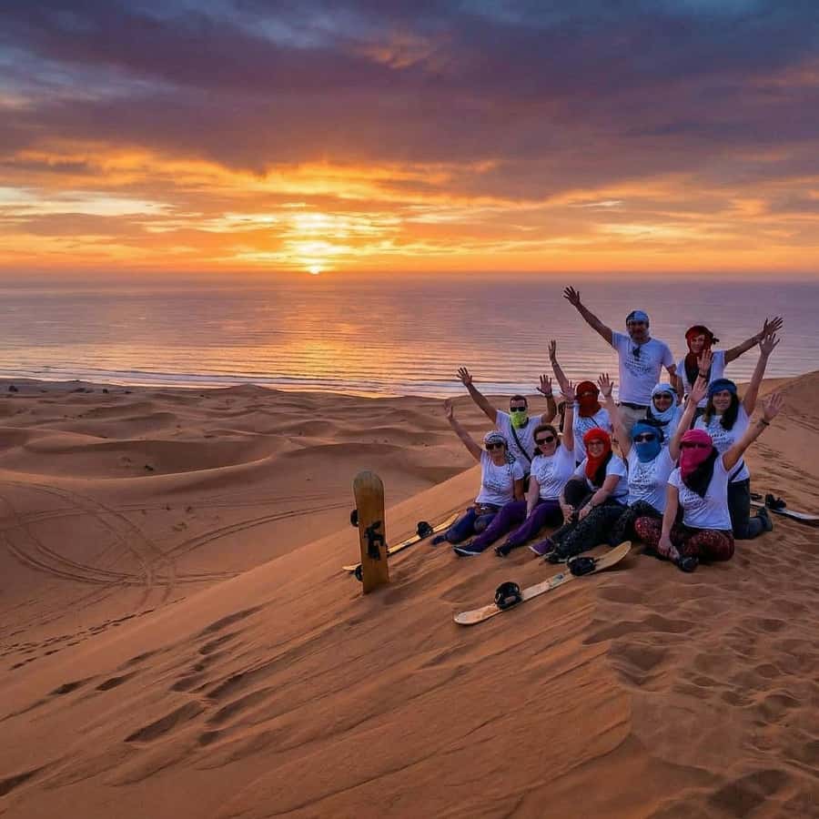 Best Agadir Desert Adventure: Quad Camel Sandboarding & BBQ - Timlalin Dunes, where sand meets the sea