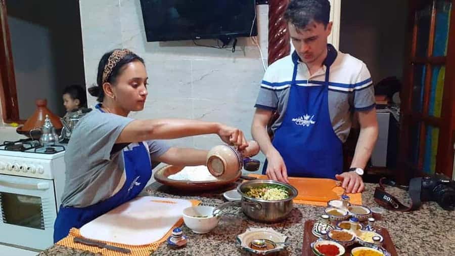Essaouira: Traditional Family Style Moroccan Cooking Class - Sitting down to the food you helped make