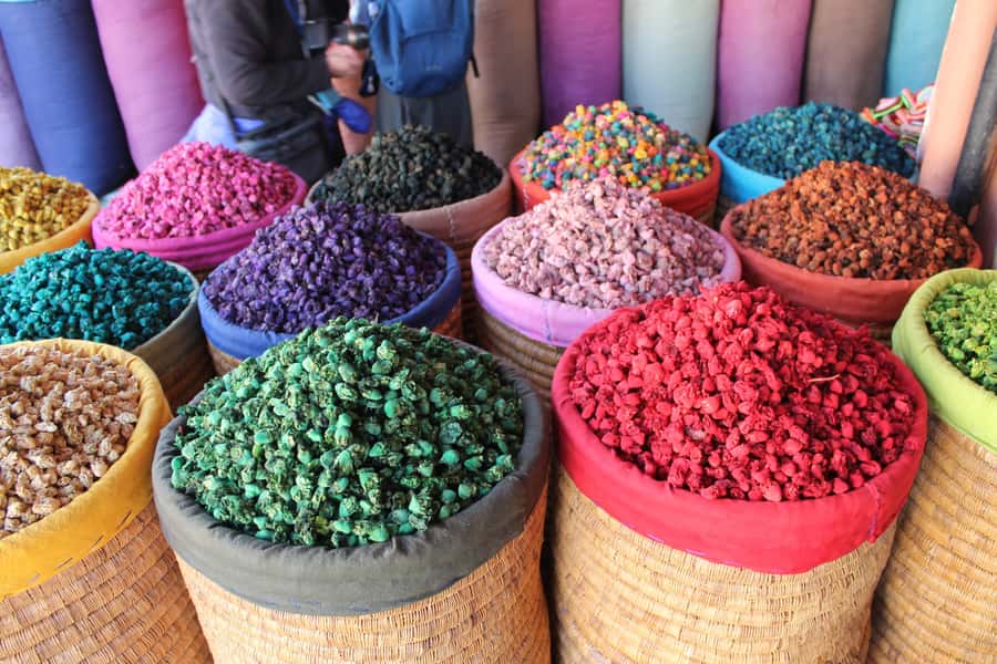 From Agadir: Guided Day Trip to Marrakech - Following the guide through the souks