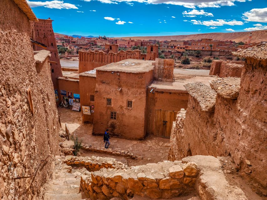 From Marrakech: 2-Days luxurious experience to Zagora Desert - Riding a camel into the Zagora desert at sunset