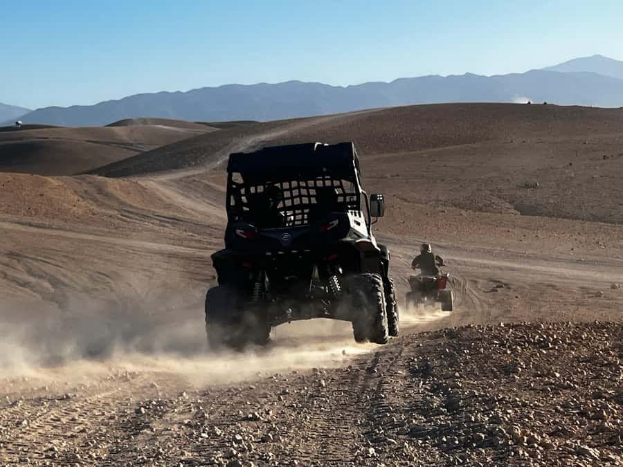 From Marrakech: Agafay Desert Buggy 1Hour & Dinner Show - Moroccan dinner with music and a fire show
