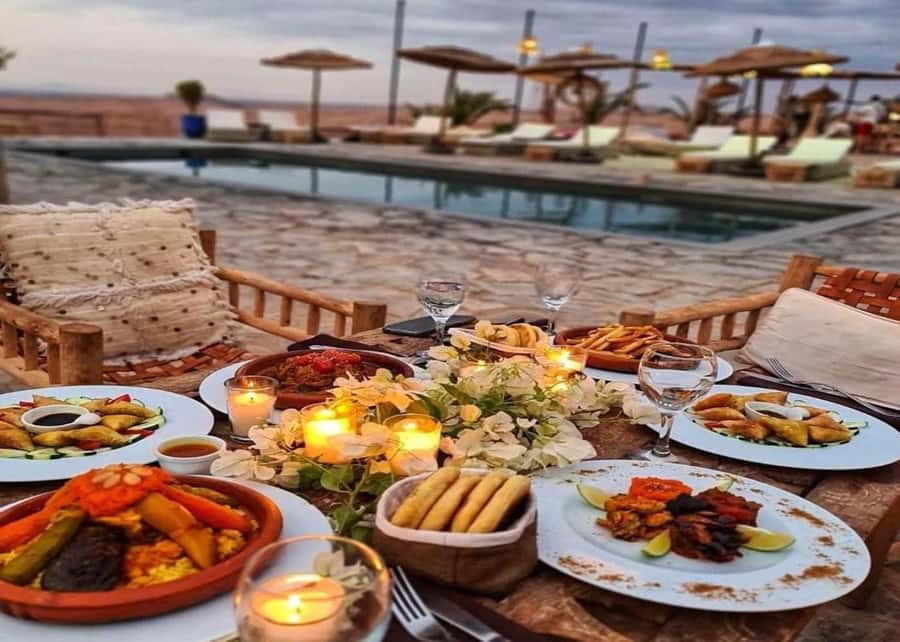 From Marrakech: Agafay Desert Sunset Dinner with Live Show - Arriving in Agafay with mint tea