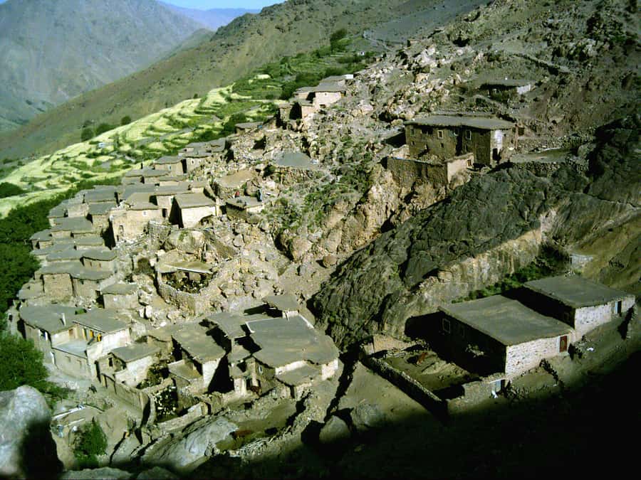 From Marrakech: Atlas Mountains and Berber Village Day Trip - Walking through Tachedirt and Ouanskra