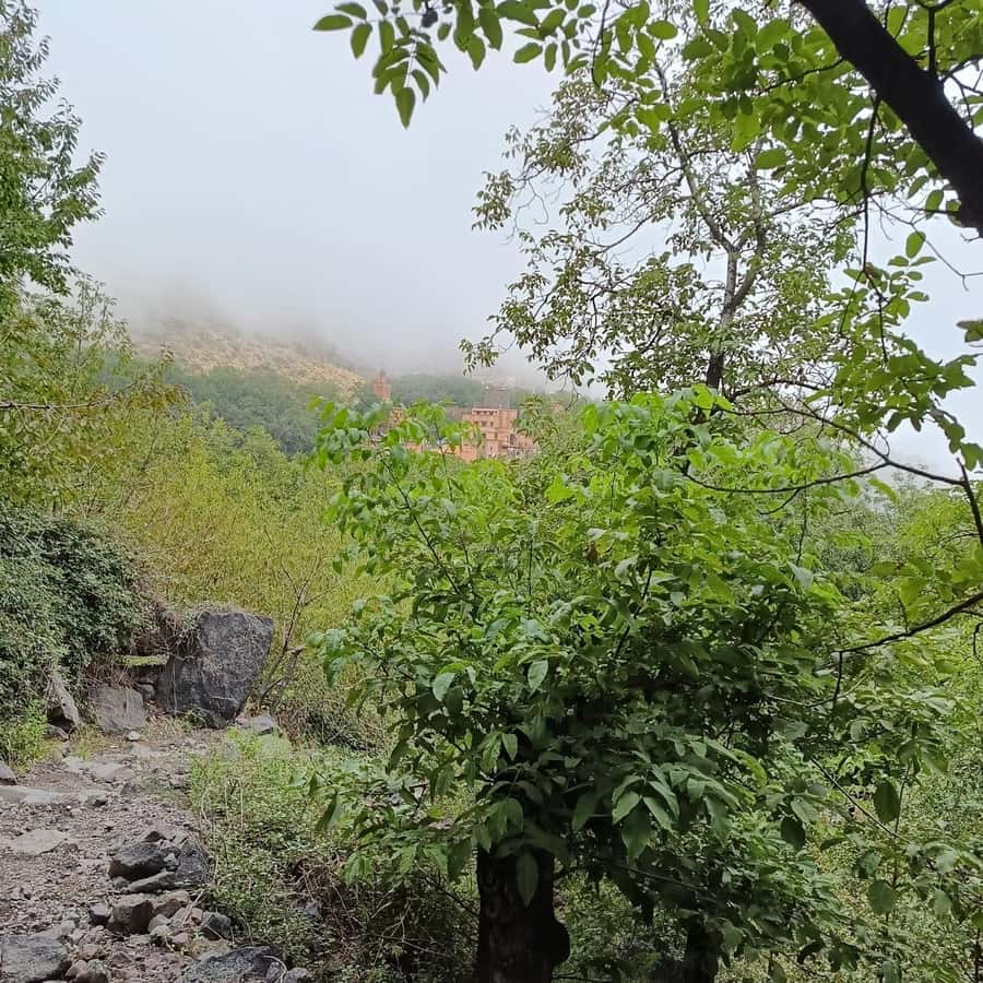 From Marrakech: Atlas Mountains Summit Trek - The descent through villages and the Tidli Plateau