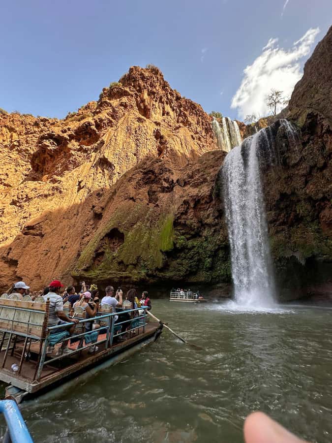 From Marrakech:Ouzoud Waterfalls Day Trip with Boat Tour - The boat ride under the falling water