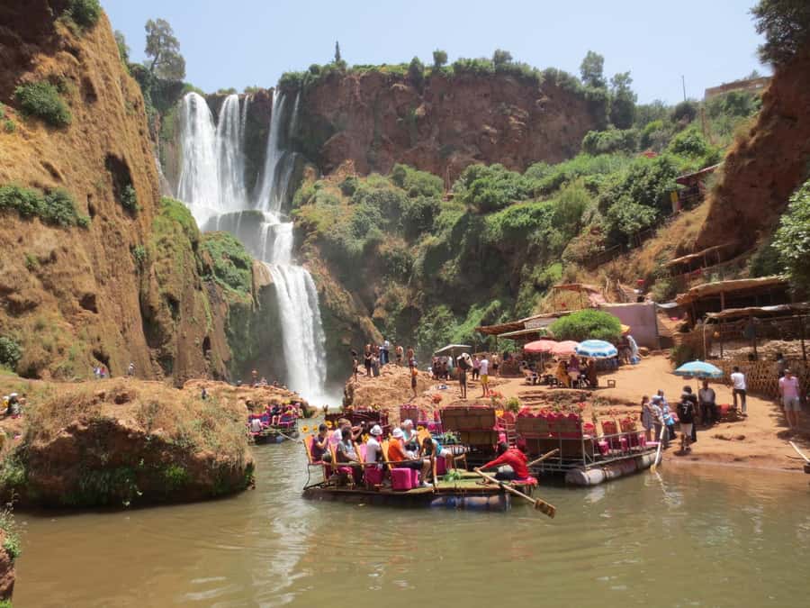 From Marrakech: Ouzoud Waterfalls Guided Tour and Boat Trip - The boat ride near the spray