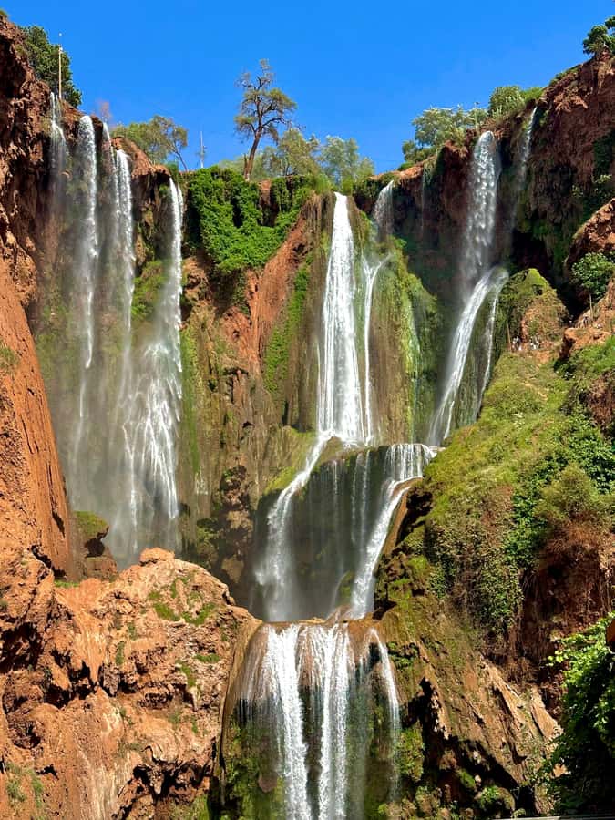 From Marrakech: Ouzoud Waterfalls Guided Trip with Boat Ride - The boat ride beneath Ouzoud’s falling water