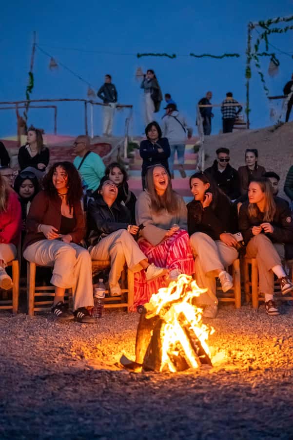 From Marrakech: Sunset Desert Tour with Camel Ride & Dinner - Crossing the sand by camel at sunset