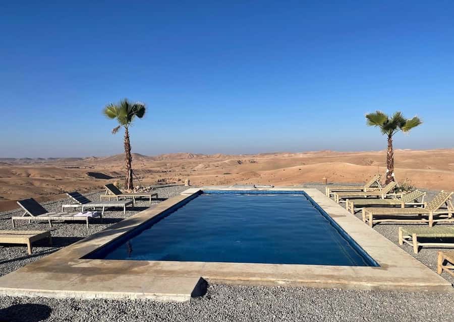 From Marrakech: Sunset Desert Tour with Camel Ride & Dinner - Berber music, dancing, and the fire show
