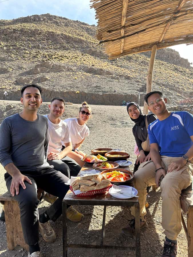 From Marrakesh: Atlas Mountains Talamrout Summit Day Hike - Lunch, mint tea, and the descent