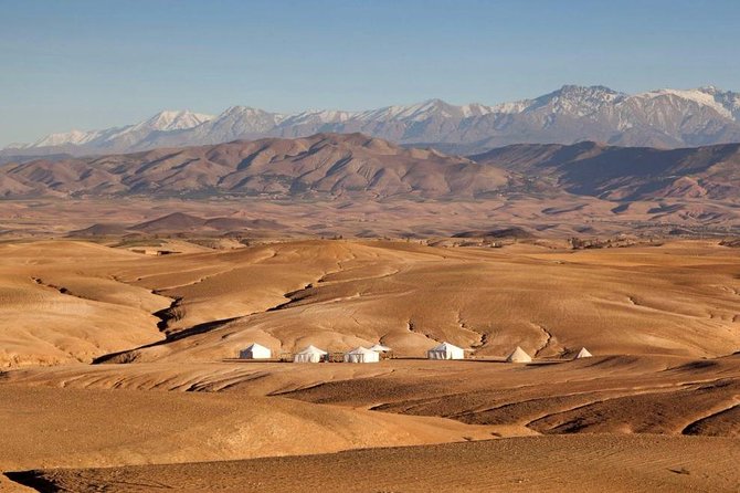 Full-day Agafay Desert and Atlas Mountain Tour - Sharing food with a Berber family