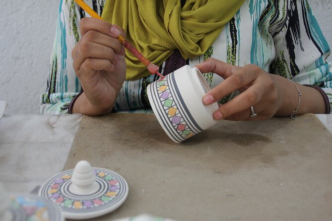 Guided Pottery and Zellige Workshops in Fes Morocco - Making a zellige mosaic piece