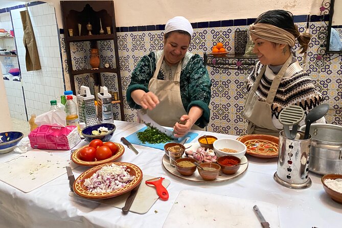Half-Day Cooking Class with Local Chef Laila in Marrakech - Making the main course with Ras El Hanout
