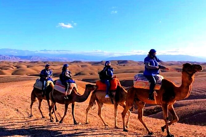 Marical dinner and camel ride at sunset in Desert of Marrakech - Waterfalls, villages, and a family meal