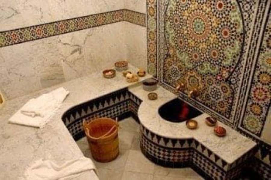 Marrakech: 3H Traditional Hammam & Massage & Hotel Transfer - Entering the steam room for the 45-minute hammam