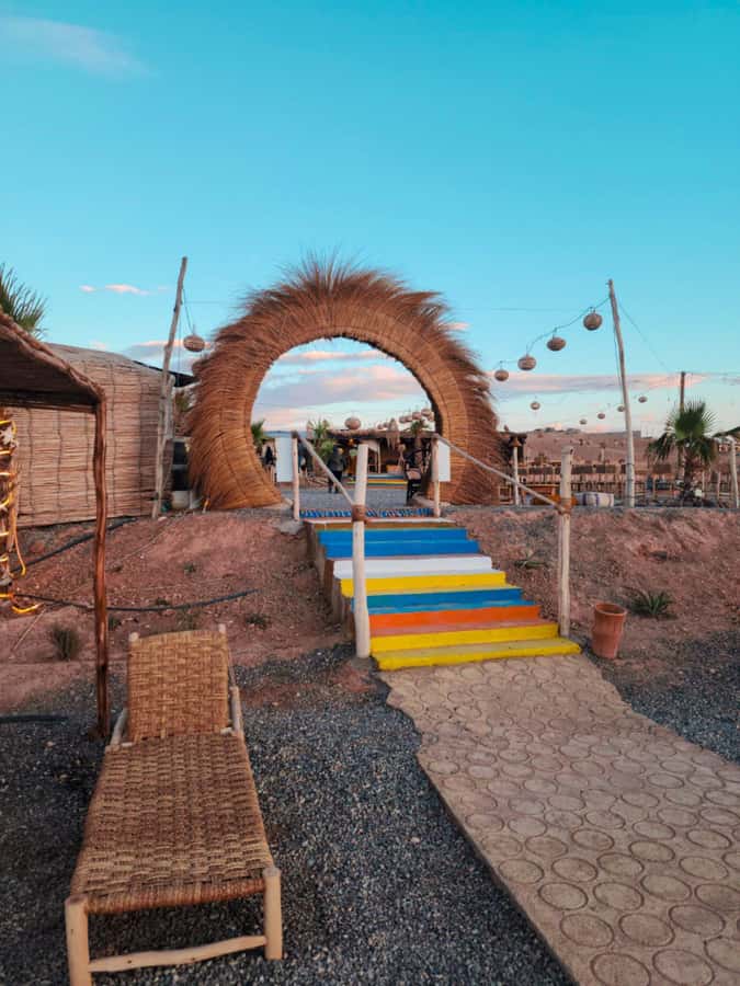 Marrakech: Agafay Camel Ride & Dinner with Fire Show Tour - Riding a camel across rocky Agafay