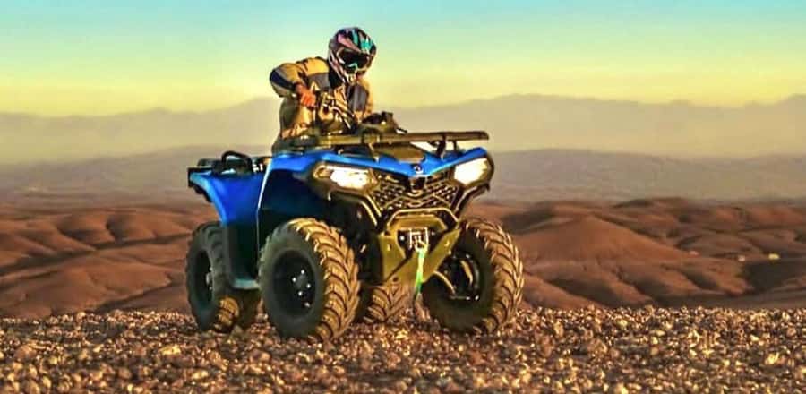 Marrakech: Agafay Desert Camel, Quad Bike & Dinner Show - Quad biking across the Agafay trails