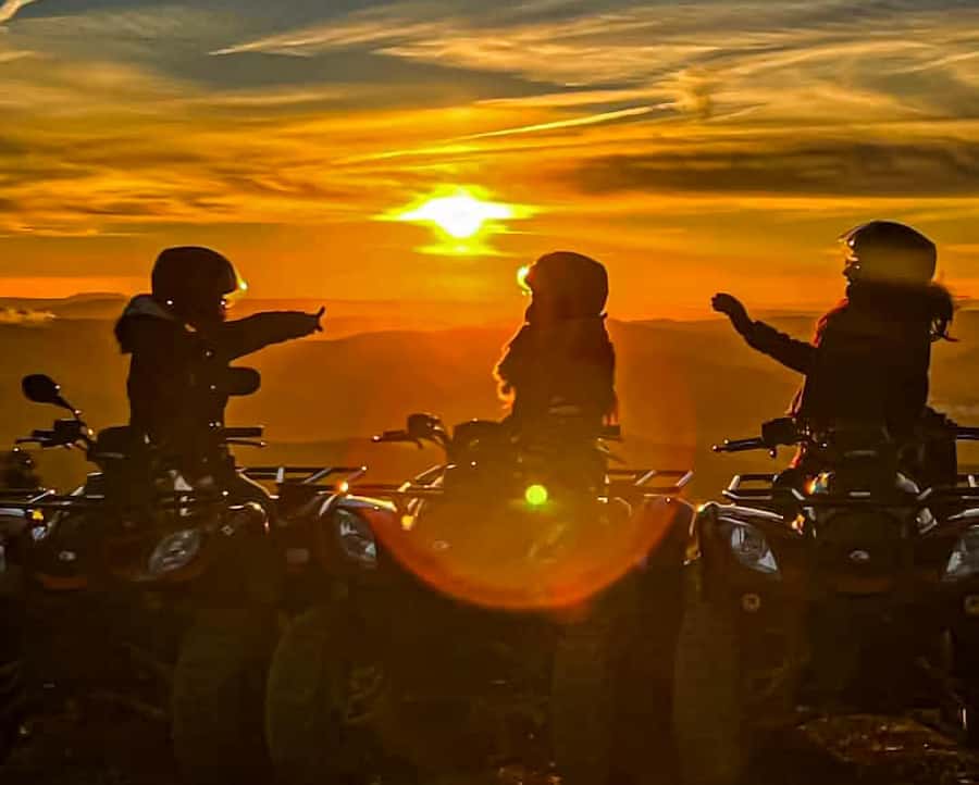 Marrakech: Agafay Desert: Camel ride Quad Bike, Dinner show - Riding a camel as the sun goes down