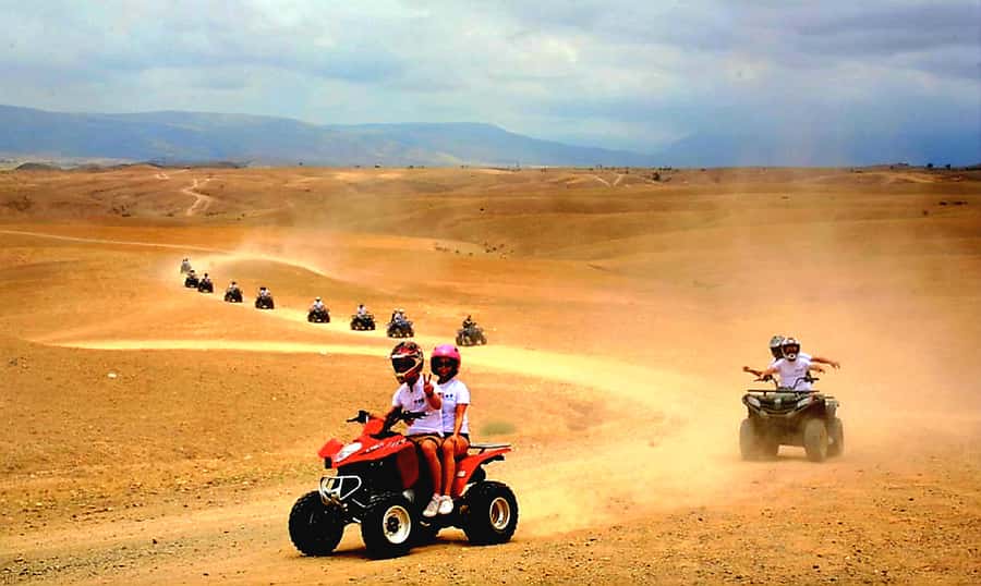 Marrakech: Agafay Desert Dinner Show with Quad Bike & Camel - Quad biking across the open desert