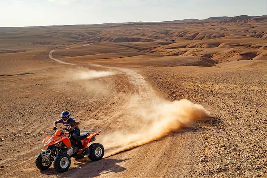Marrakech: Agafay Desert Dinner Show with Quad Bike & Camel - Transport, guides, and the pace of the day
