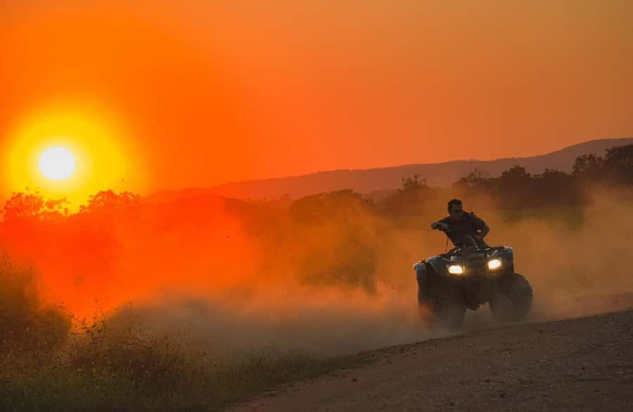 Marrakech: Agafay Desert Tour Quad bike & Dinner fire show - Quad biking across Agafay