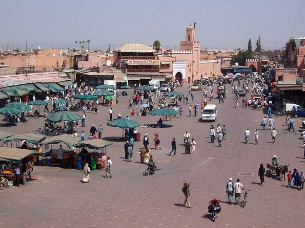 Marrakech: Bahia Palace, Saadian Tombs, Souk and Medina Tour - Walking through the Mellah