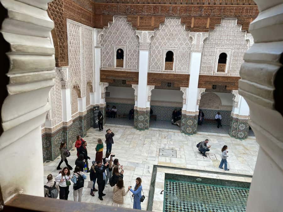 Marrakech: Ben Youssef Guided Tour with Skip-the-Line Entry - Entering Ben Youssef’s central courtyard
