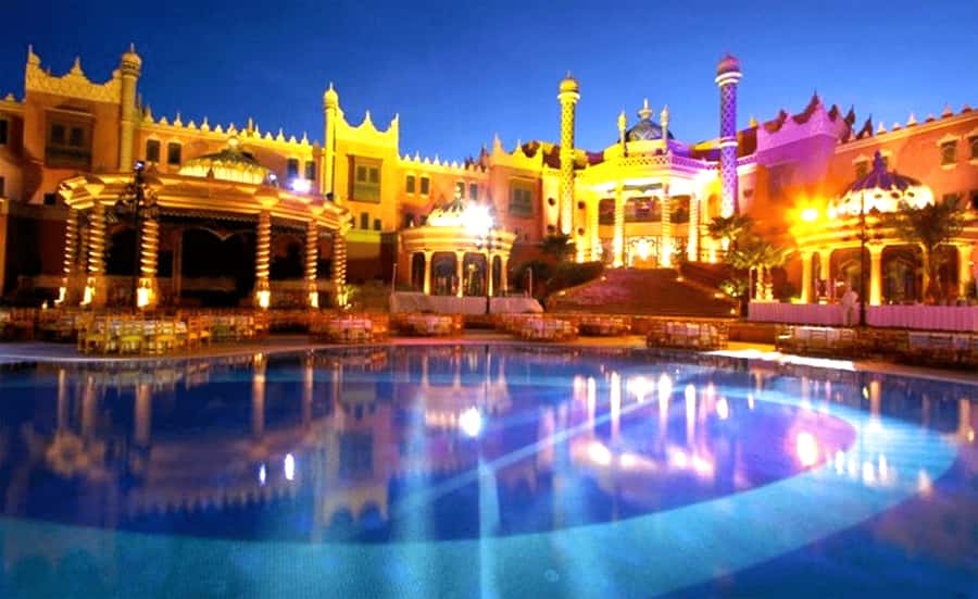 Marrakech: Chez Ali Fantasia Folklore Show & Moroccan Dinner - Costumed riders, Ali Baba’s cave, and the first photo stop