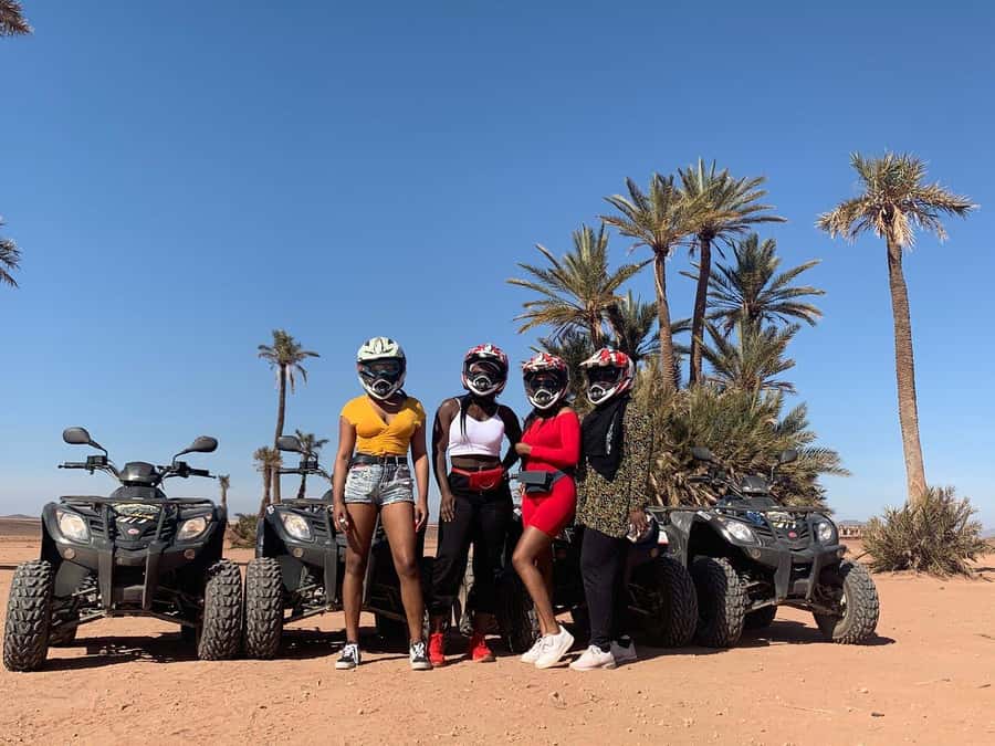 Marrakech: Desert and Palm Grove Sunset Quad Tour with Tea - Tea, bread, honey, and olives with local hosts