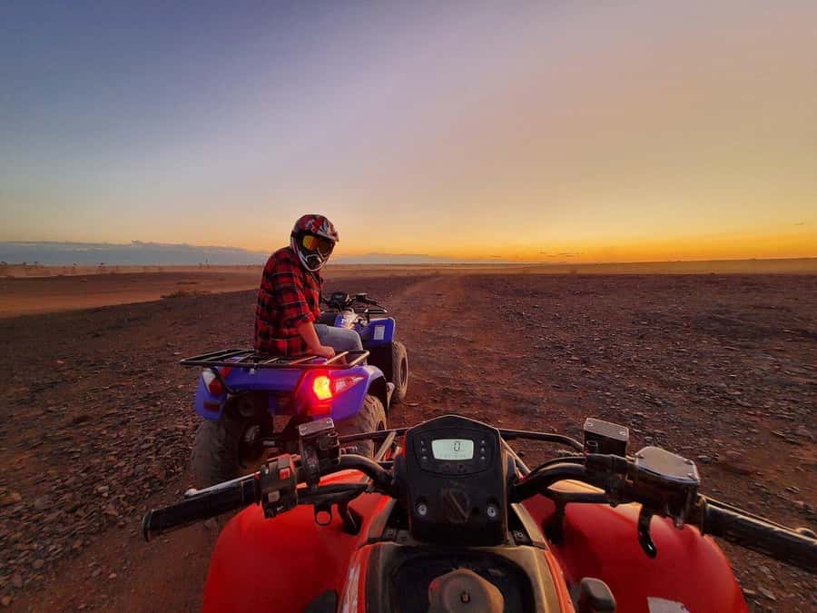 Marrakech: Desert and Palm Grove Sunset Quad Tour with Tea - Getting started with a helmet and a short practice session