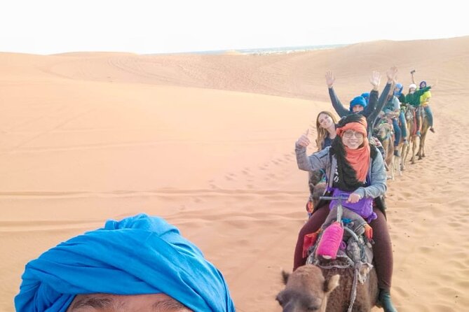 Marrakech Desert: Camel Ride, Quad Biking & Dinner Show Options - Camel riding on rocky desert trails