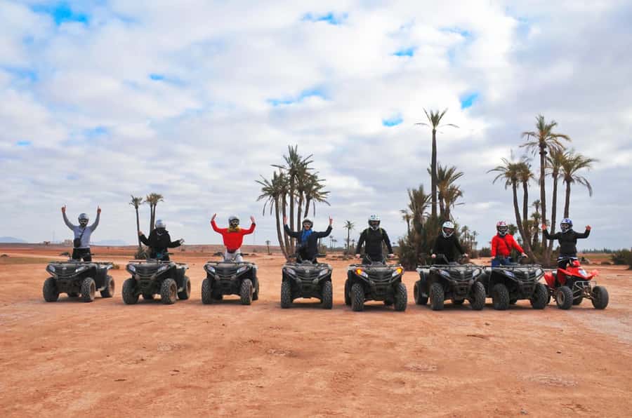 Marrakech Desert & Palm Grove Quad Bike Tour - Riding through palm groves and rocky desert tracks
