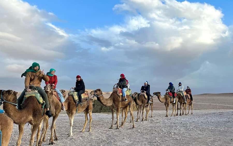 Marrakech Dinner Show Agafay Desert with Camels swiming pool - A sunset camel ride across Agafay