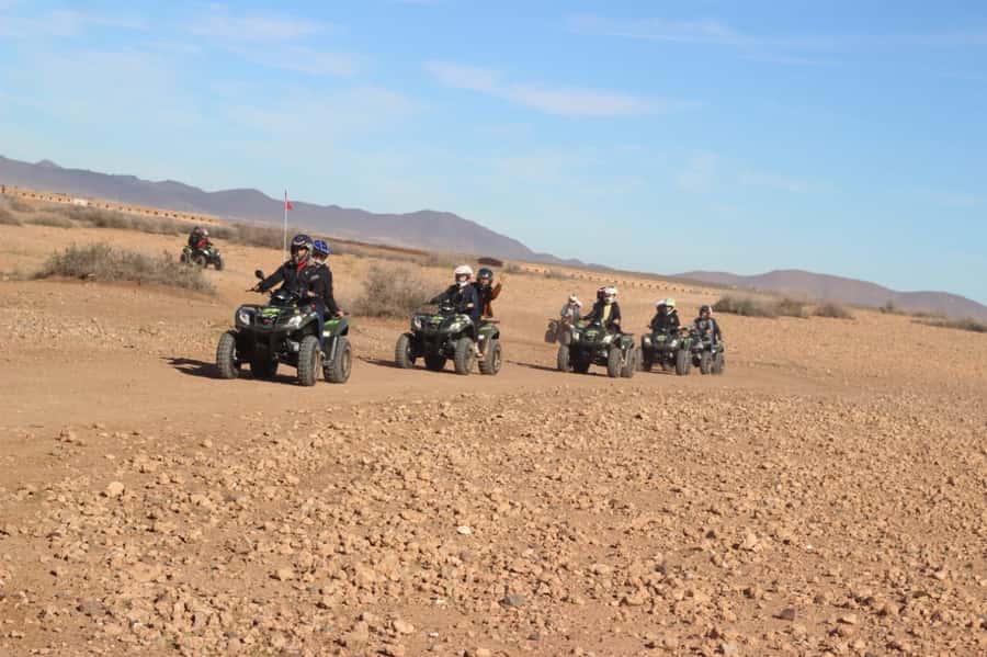 Marrakech, explore the palm grove desert by quad bike - Mint tea and mssemen at a local stop