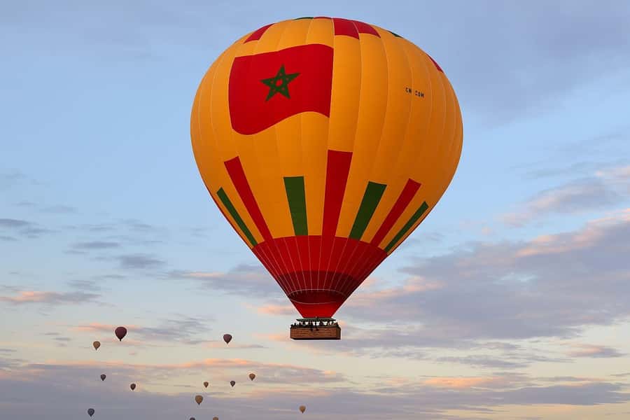 Marrakech: Hot Air Balloon Flight with Berber Breakfast - Coffee, cake, and the balloon setup