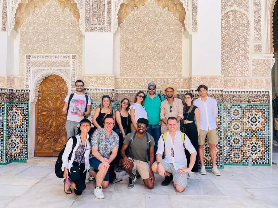 Marrakech: Madrasa Ben Youssef, Secret Garden & Medina Tour - Hammams, spice stalls, and the old water system