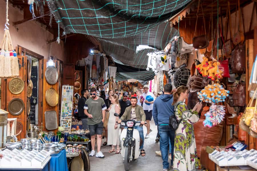 Marrakech: Medina, Souks, Artisans Guided Tour with Mint Tea - Leather and textiles along Souk Semmarine