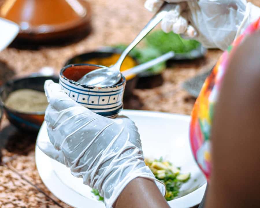 Marrakech: Moroccan Cooking Class with Pickup - Choosing the menu: salad, tagine, and oranges