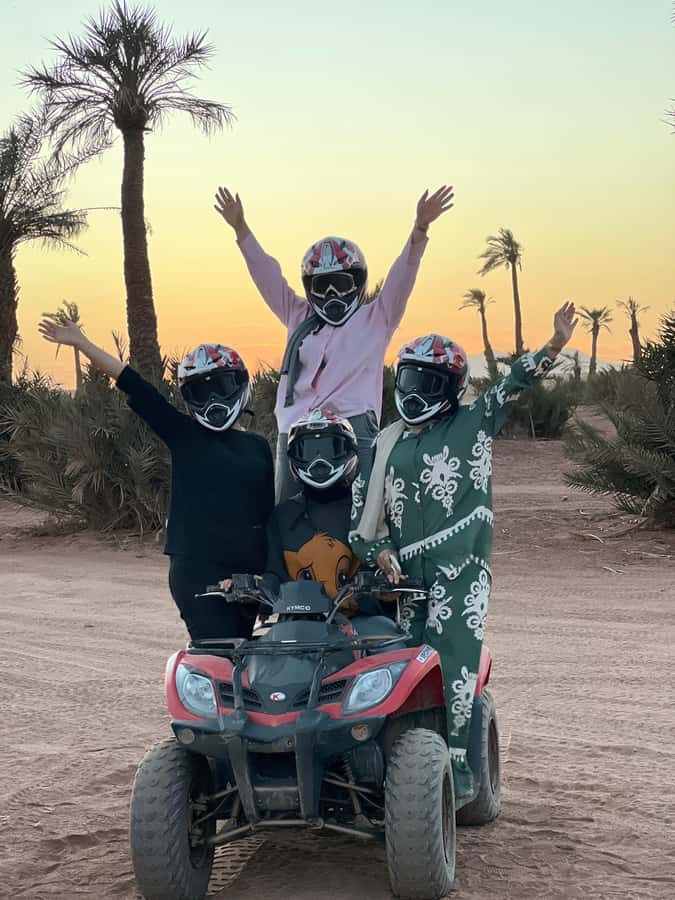 Marrakech: Palm Grove and Jbilat Desert Quad Bike Tour - Palm trees, village views, and the photo break