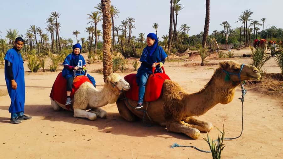 Marrakech Palmeraie: Camel Ride & Quad Bike Experience - Safety briefing, helmets, and quad bikes
