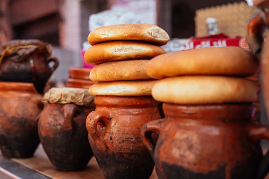 Marrakech: Private Food Tour – 10 Tastings with Locals - El Badii Palace between bites