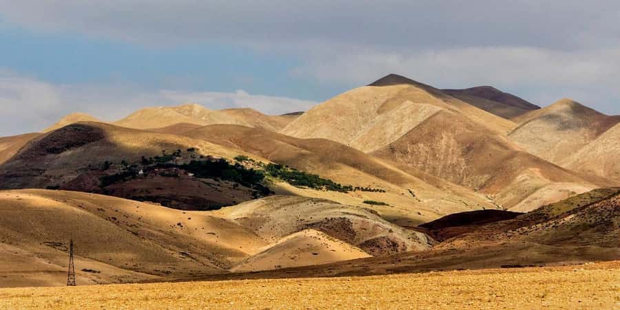 Marrakesh: Desert & Mountain Tour with Camel Ride & Lunch - Pickup, minibus roads, and the shape of the day